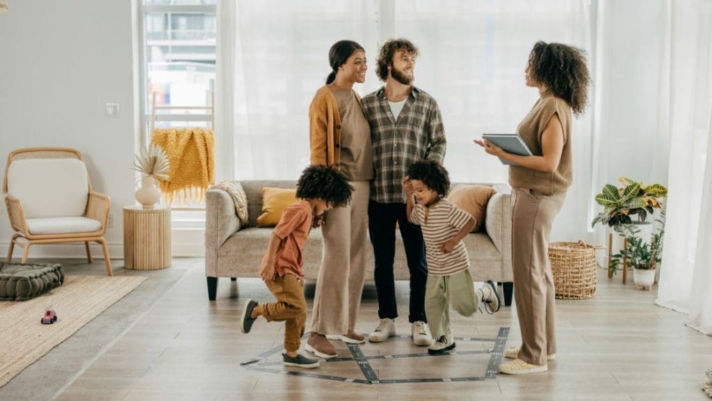 A family discussing their decision to rent or buy a home